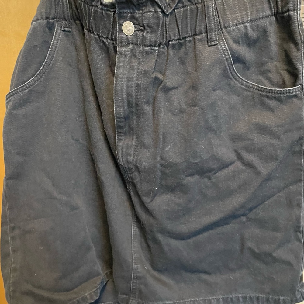 Black denim mini skirt. Paper bag style